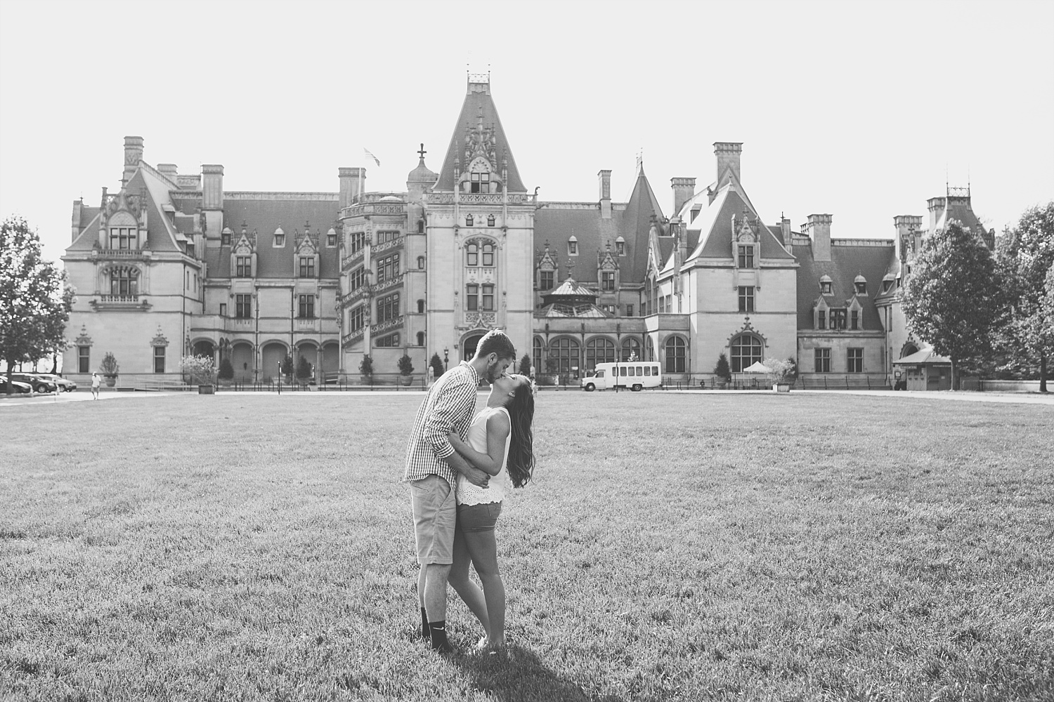 Biltmore Estate couple engaged and kissing