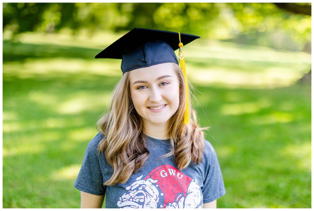 Senior Portraits with graduation cap and GWU Shirt at Taylor Ranch | Asheville Senior Photographer