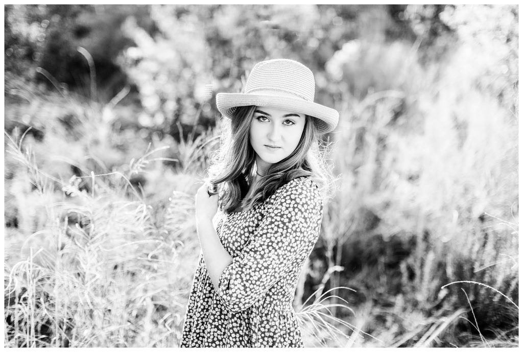 Black and White senior portraits in tall grass at Taylor Ranch | Asheville Senior Photographer