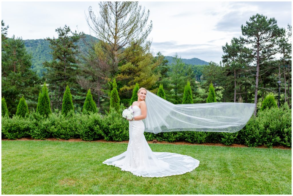 Chestnut Ridge bridal portrait session with a long flowy veil photo