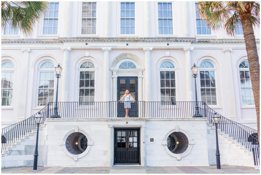 Southern and classic Charleston historic District Senior Portraits on a marble staircase