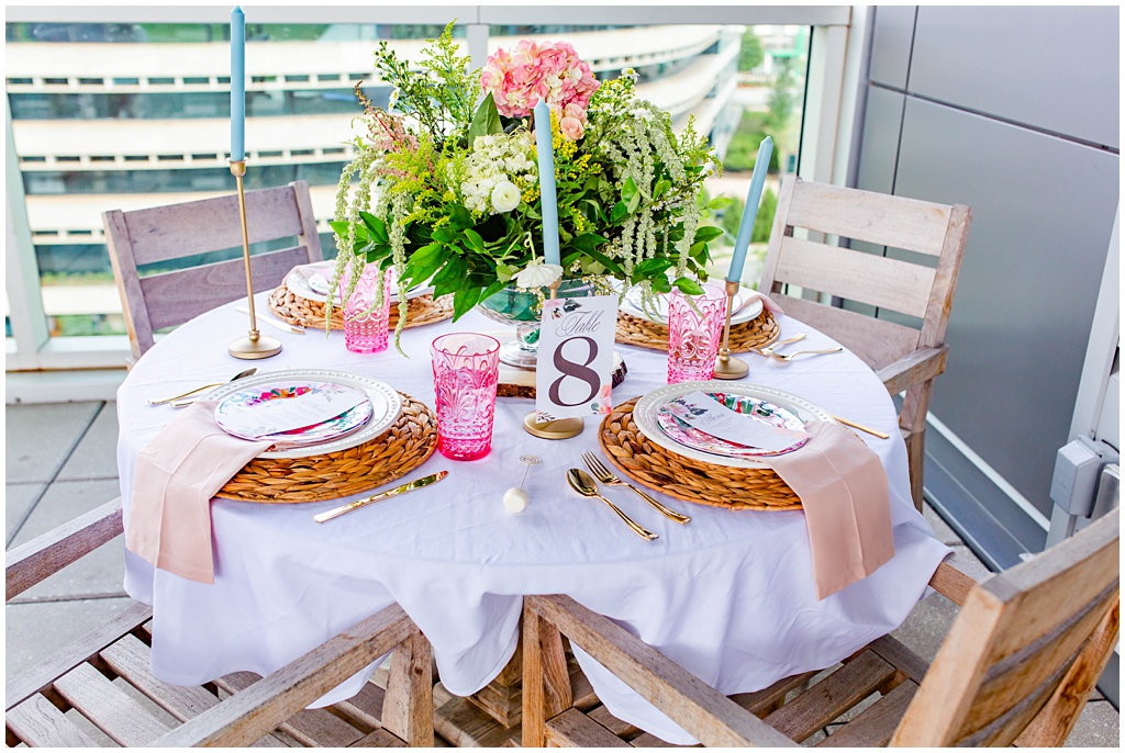 Summer wedding tablescape with pink glasses at Avenue Greenville