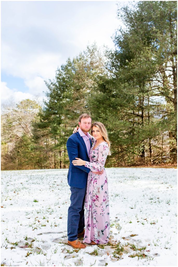 Snowy winter couples photo session at Taylor Ranch outside of Asheville, NC