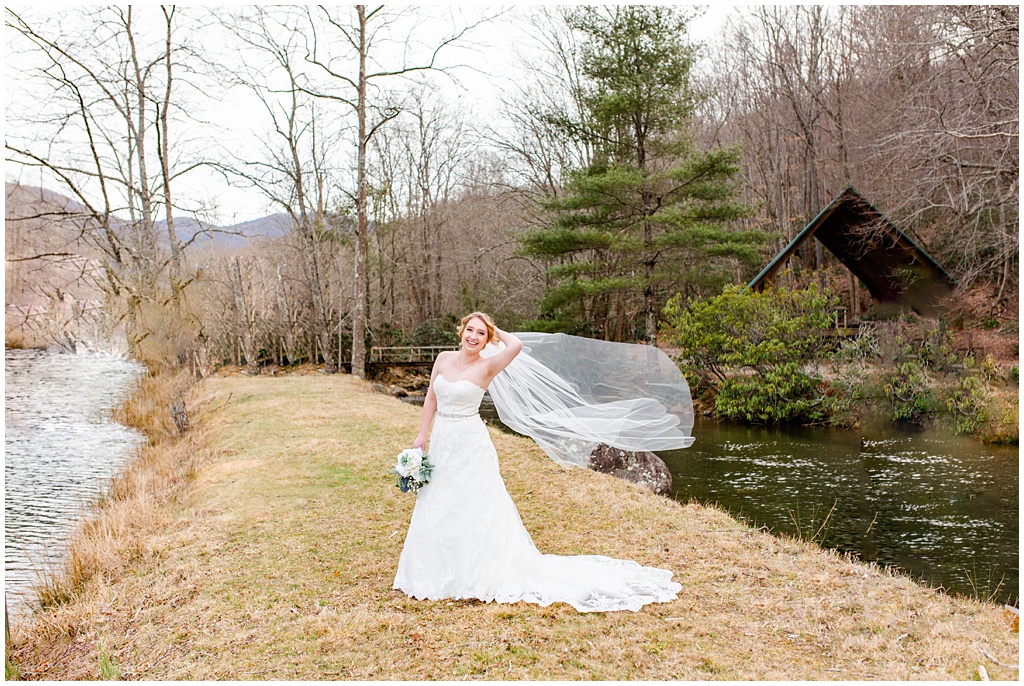 Winter bridal portrait session in Canton NC with a long flowy veil | Asheville Wedding Photographer