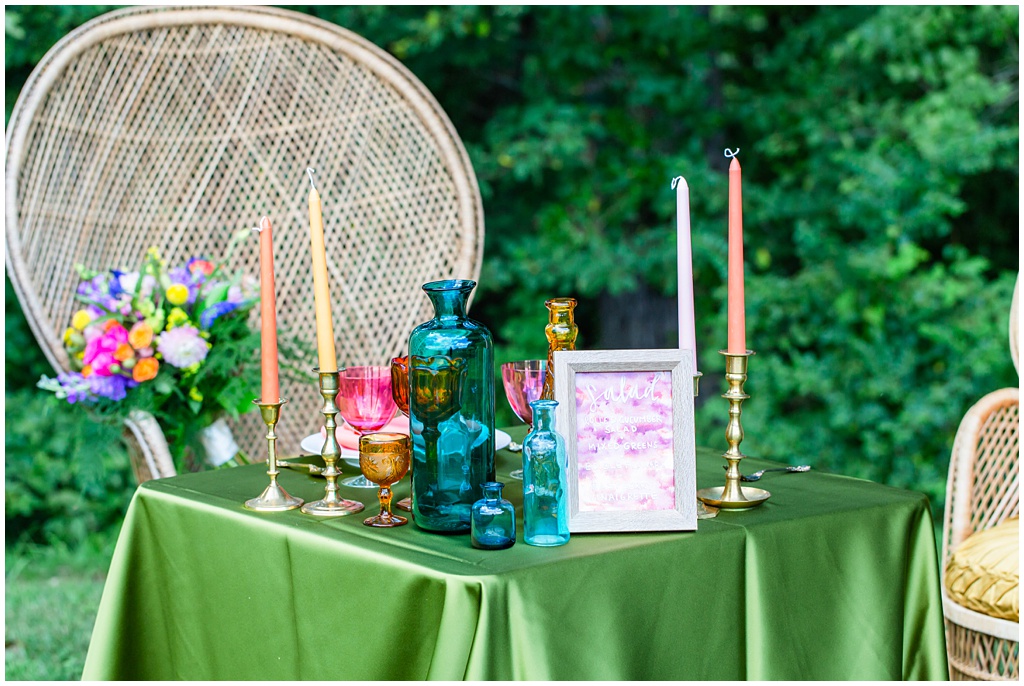 Sweetheart table with colorful table accents and decor, whimsical design