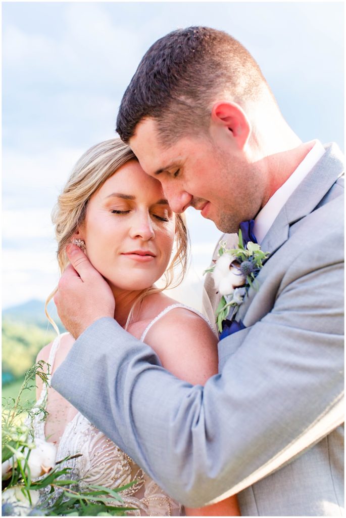Bride and groom wedding portraits with rolling mountain views at The Ridge | Asheville Wedding Photographer