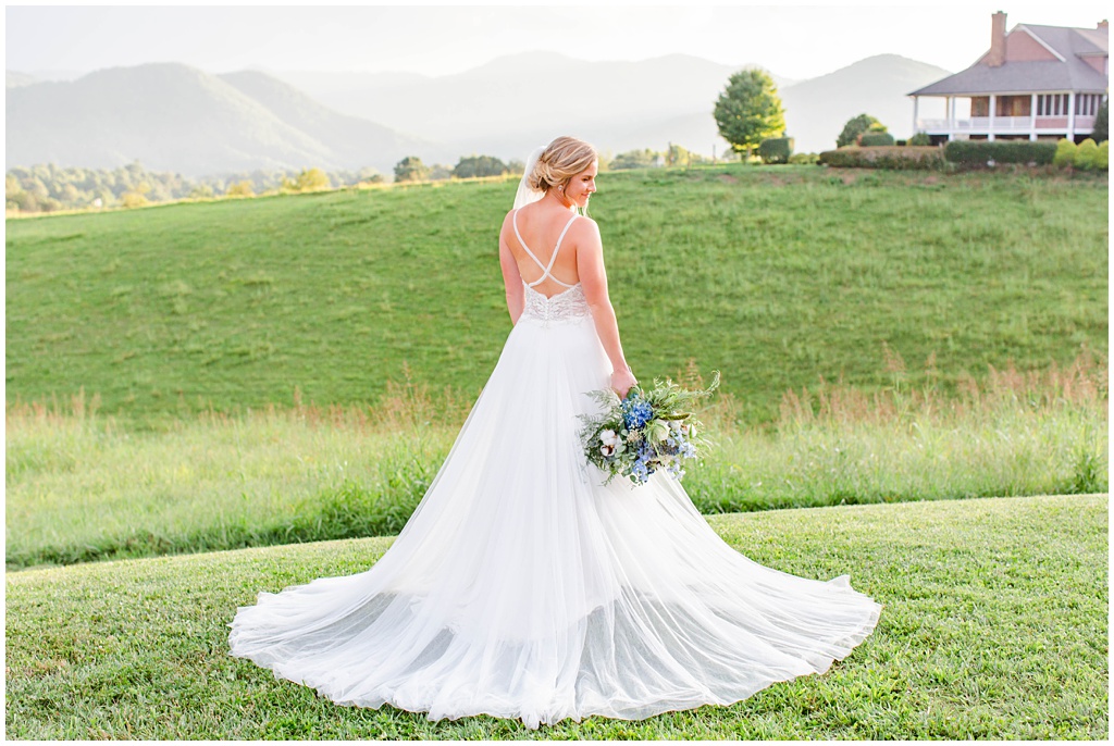 Bridal portrait with blue bouquet and rolling mountain views at The Ridge | Asheville Wedding Photographer