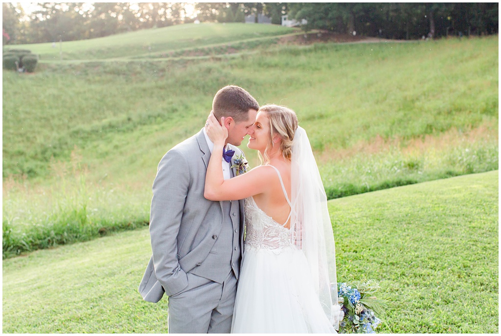 Bride and groom sunset portraits with  rolling mountain views at The Ridge | Asheville Wedding Photographer