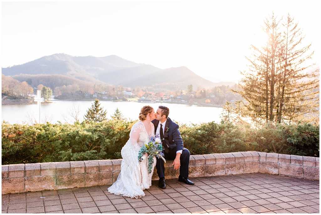 Bride and groom wedding portraits at Lake Junaluska with the sunset and mountain views.
