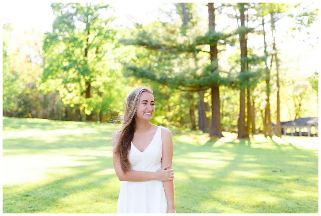 Classic high school senior portraits in a white dress at Taylor Ranch near Asheville, NC.