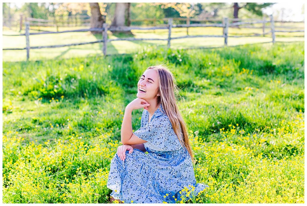Asheville high school senior photo in a blue floral dress at Taylor Ranch in Fairview, NC.
