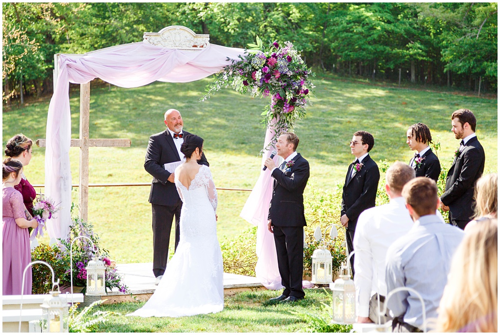 The groom sang a beautiful song during the ceremony for his bride at New Beginnings Historic Farm.