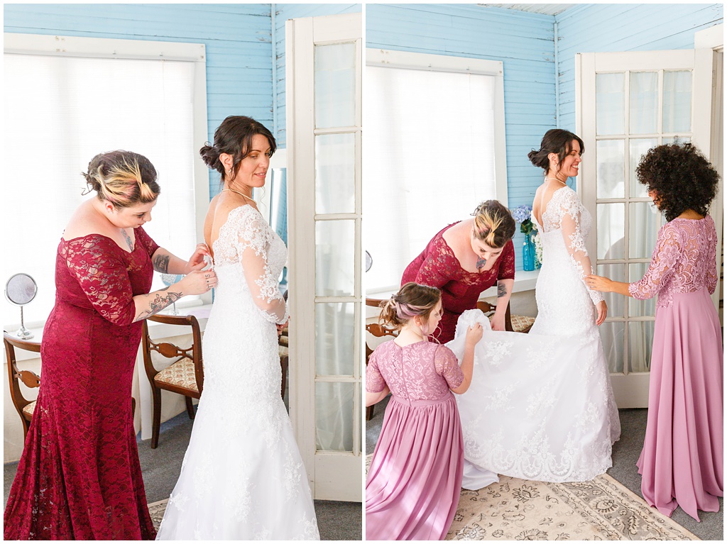 The bride getting ready with her bridesmaids before the wedding ceremony.