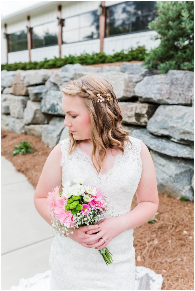 Wavy bridal hair with a bride and pearl hair piece.