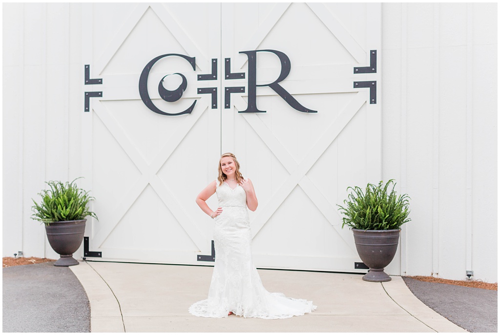Spring bridal portraits in the mountains of NC at Chestnut Ridge in front of the iconic barn doors.
