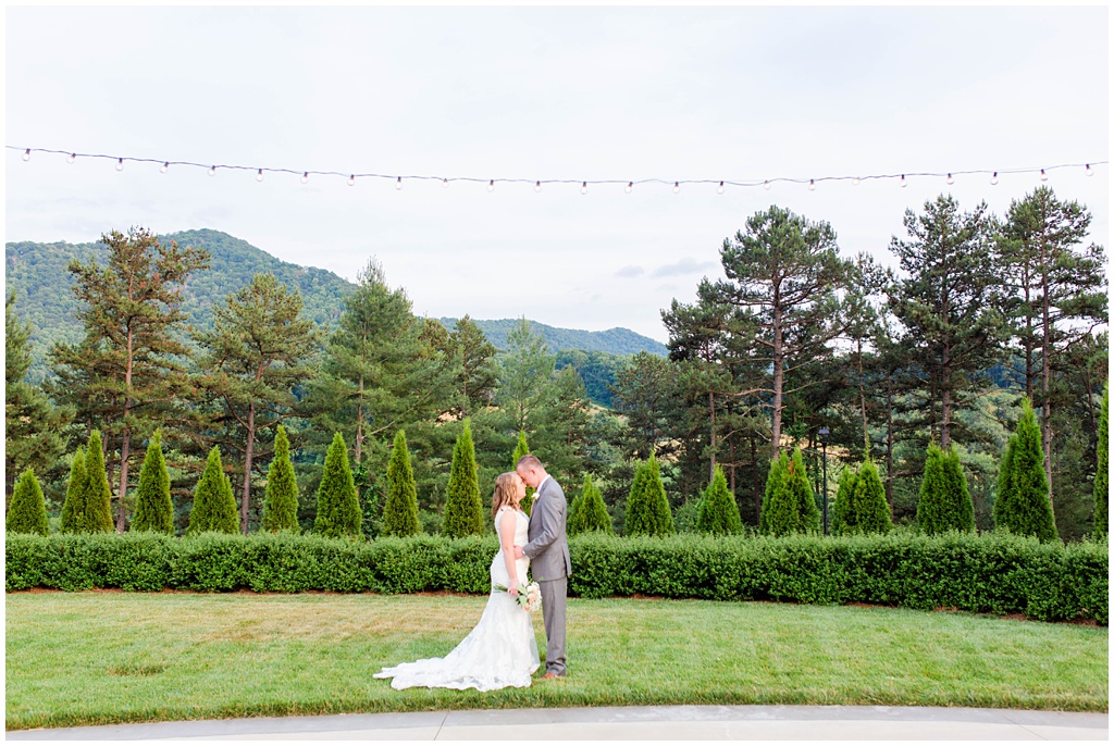 Sunset bride and groom portraits in the summer at Chestnut Ridge in North Carolina.