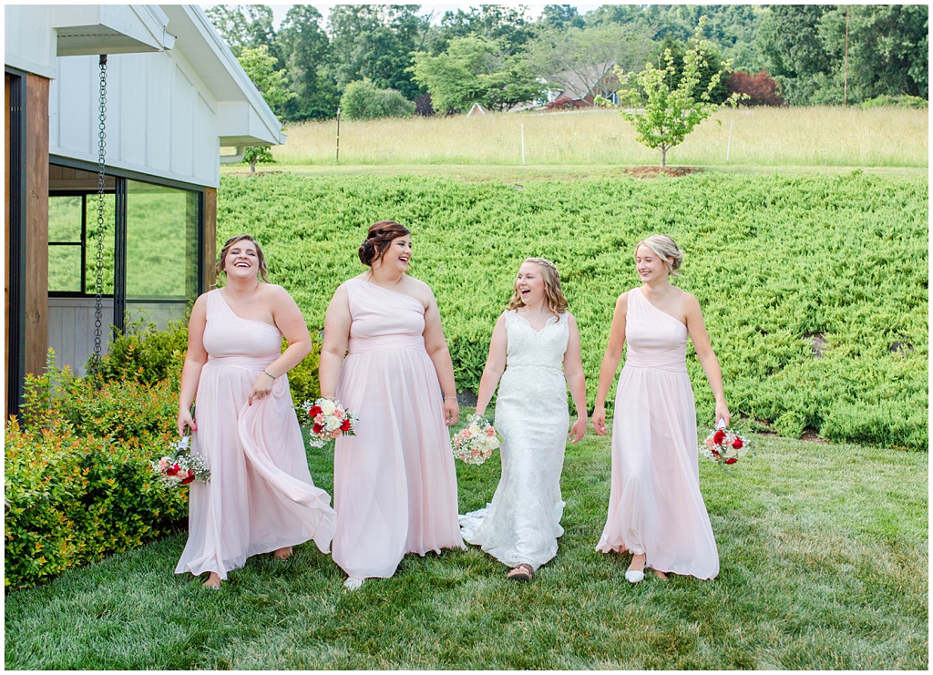 The bride walking with her bridesmaids.