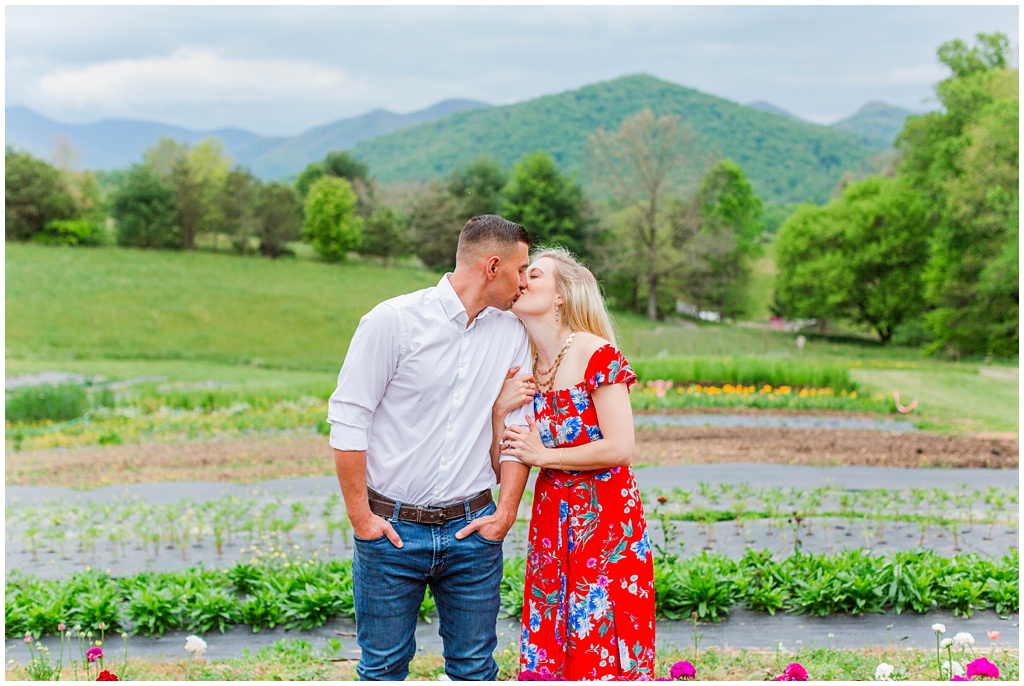 Engagement photos with flower fields and mountain views.
