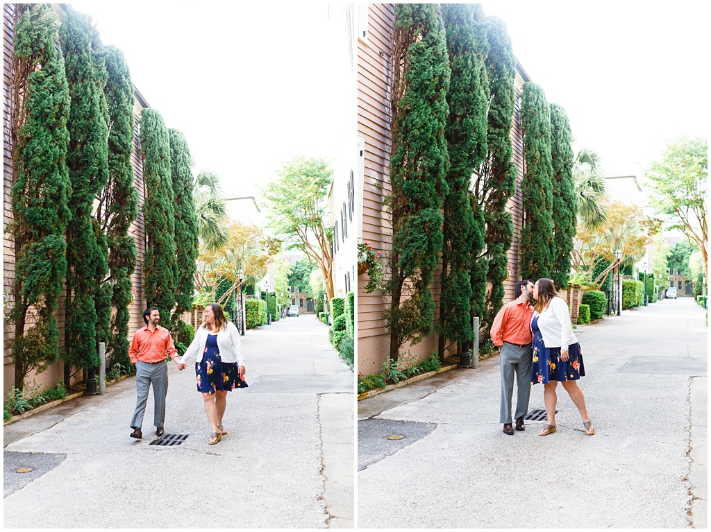 Walking together through the streets of downtown Charleston with tall trees.