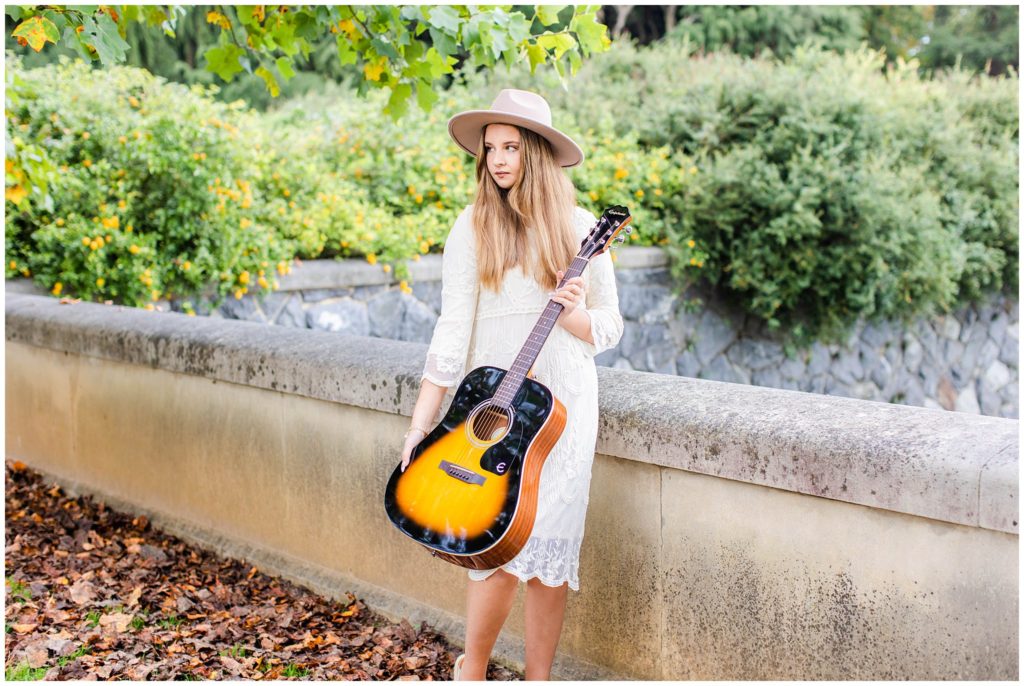 Bailey brought her grandfather's guitar to her senior session to include him.
