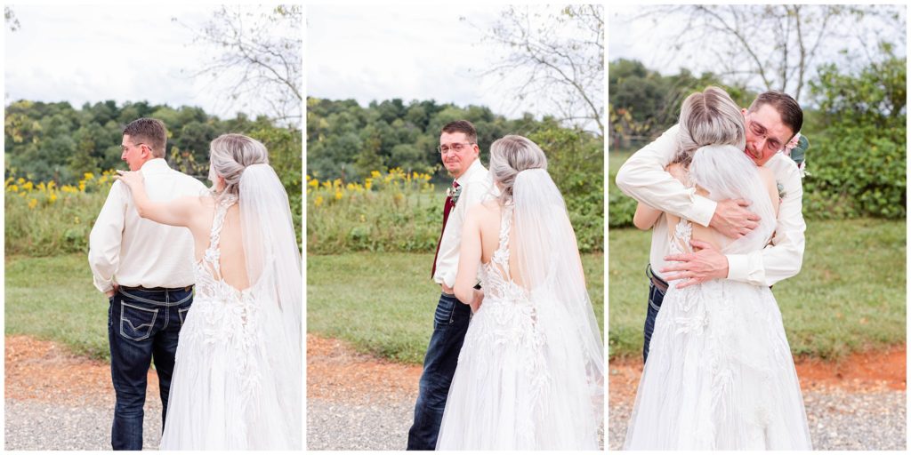 The bride shares a tearful first look with her dad on her wedding day.