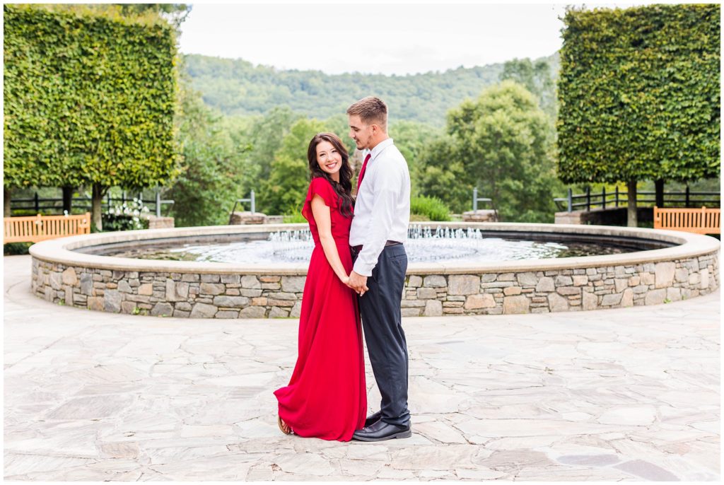 NC Arboretum Engagement photos in Asheville with a red dress