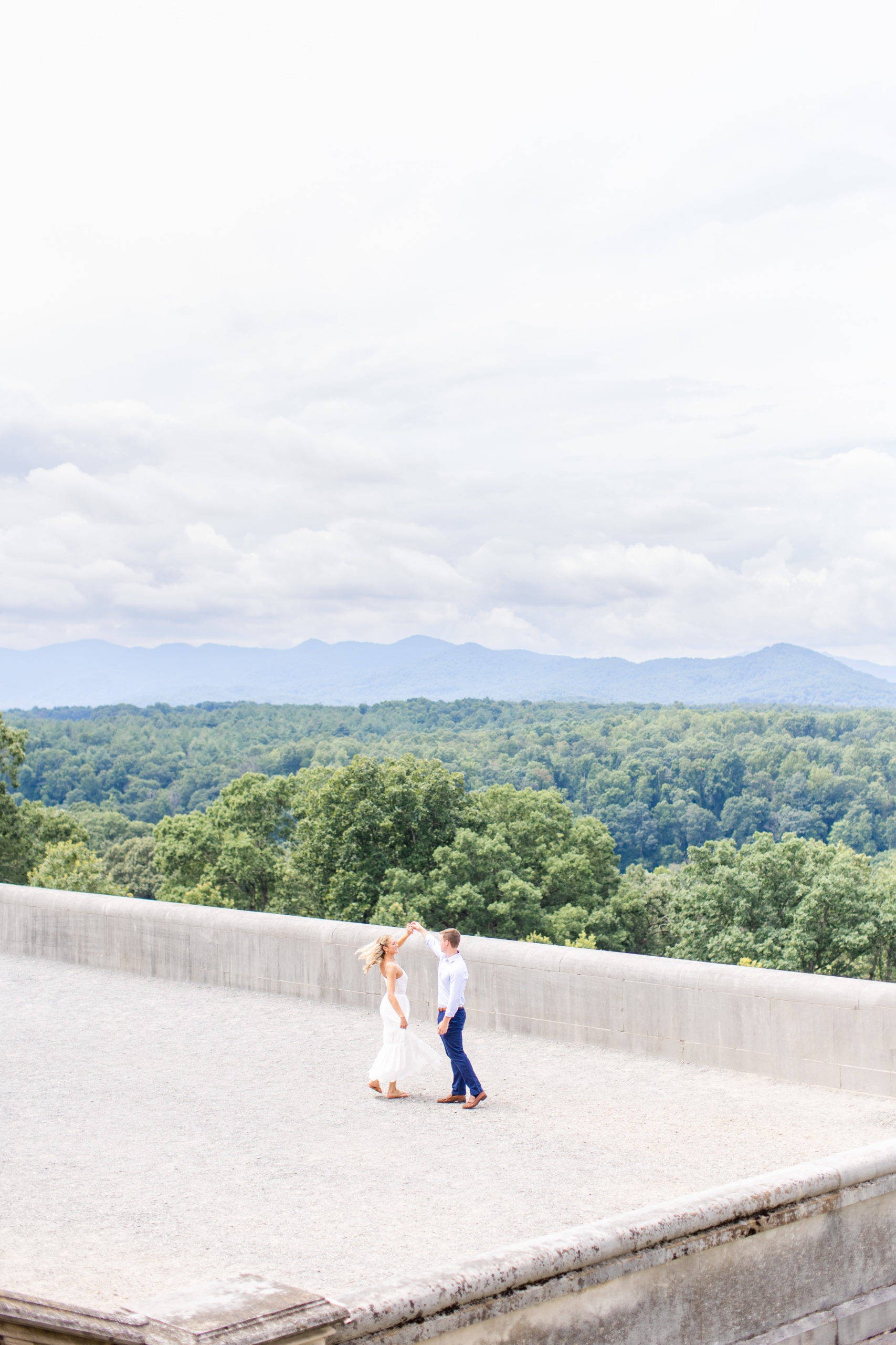 Couple who just got engaged has a photo shoot on top of Biltmore