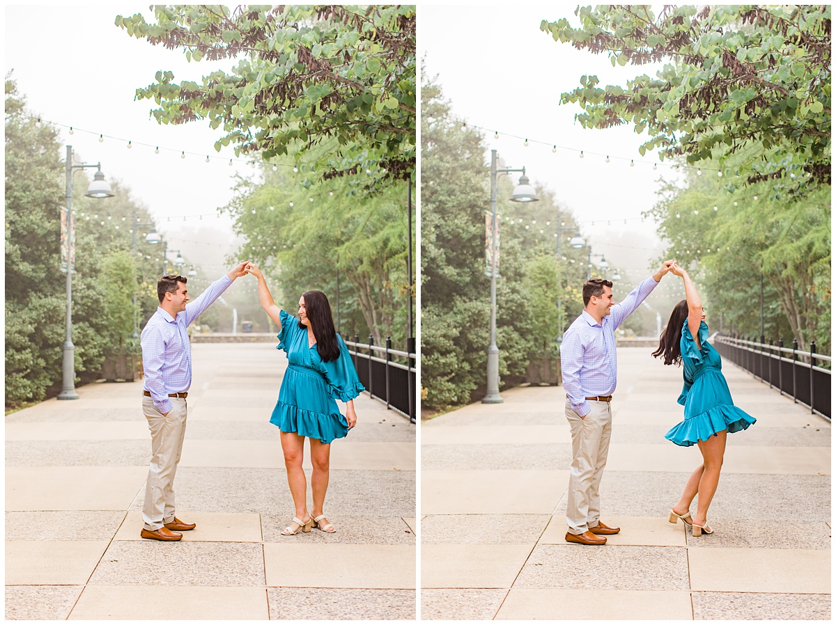 couple twirls outside for their engagement session