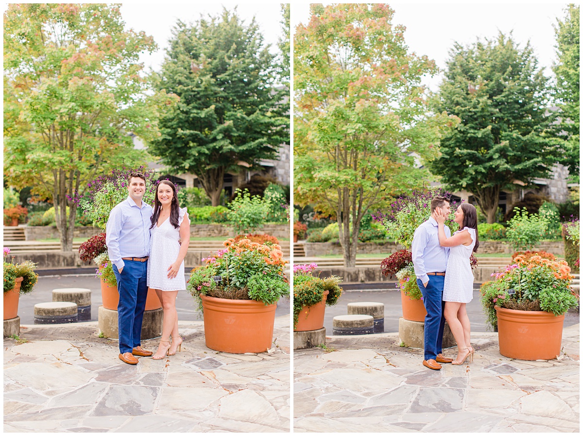couple poses in a garden for their engagement photos
