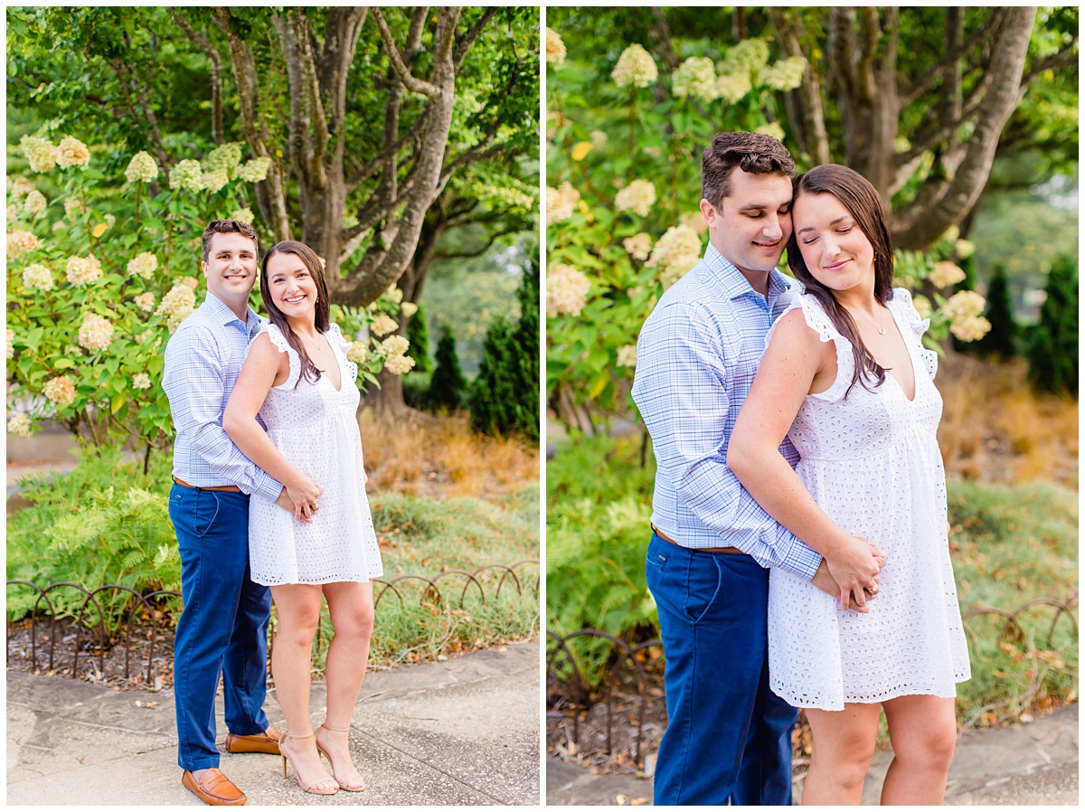 couple snuggles close during their outdoor engagement session
