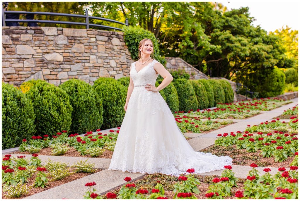bride poses at the NC Arboretum for her Asheville bridal portraits