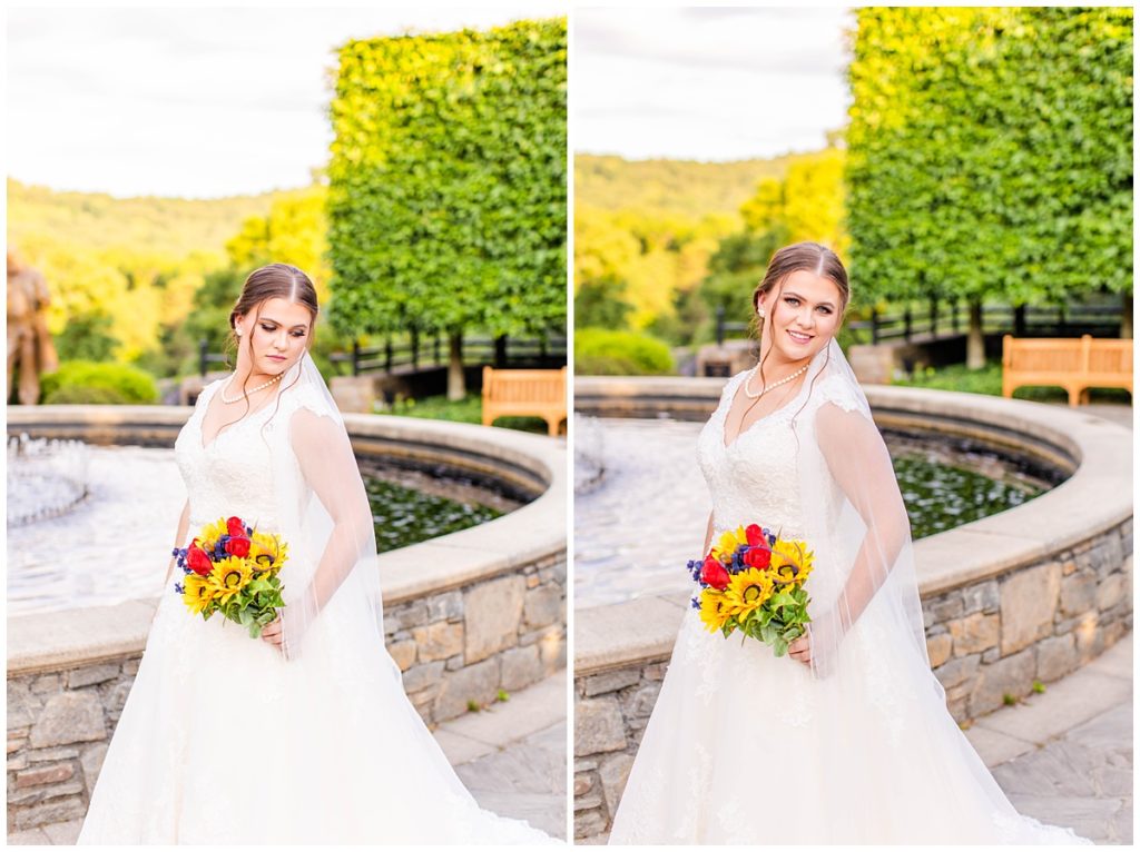 bride holds bouquet in front of fountain at the NC Arboretum