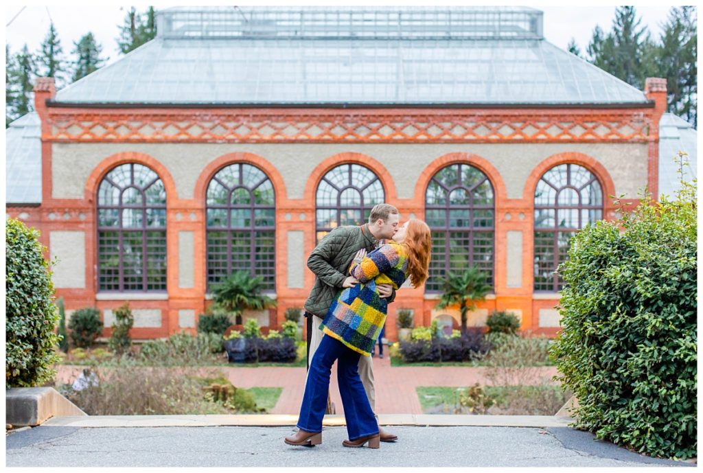 couple kisses at the Biltmore Estate for their engagement session