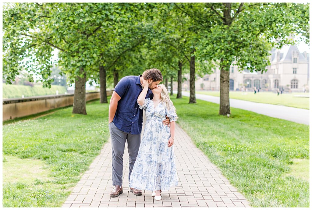 engaged couple kissing for their Biltmore Estate engagement session
