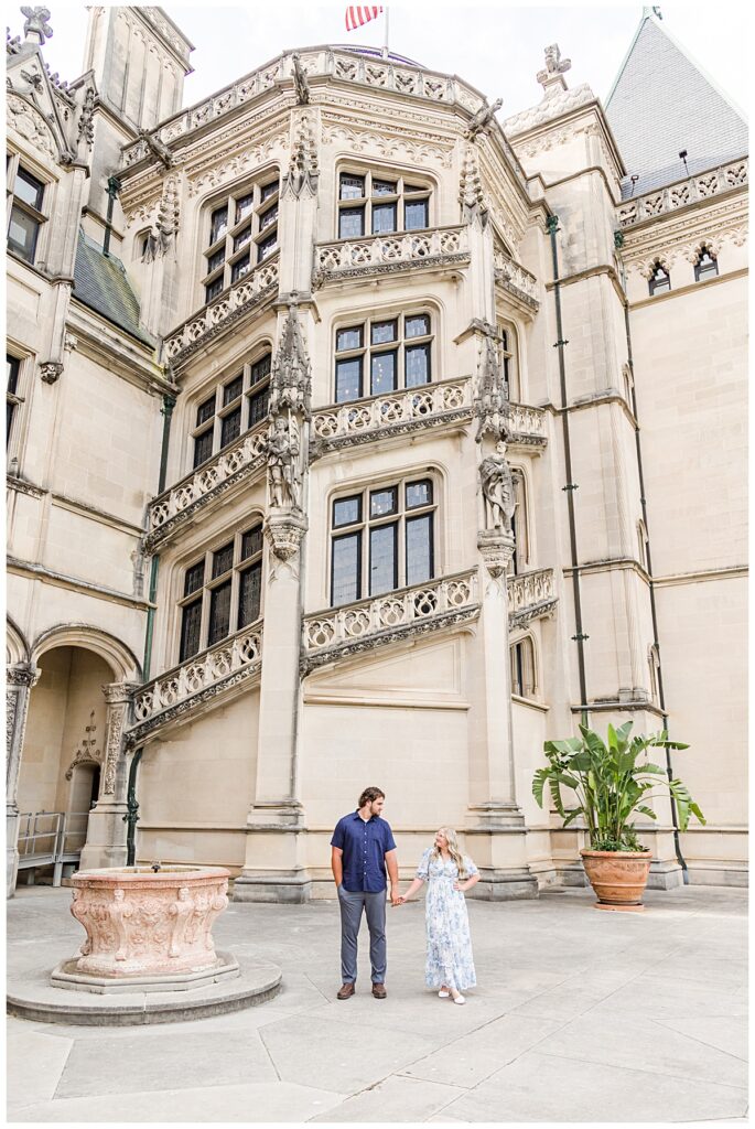 couple walking in front of grand biltmore