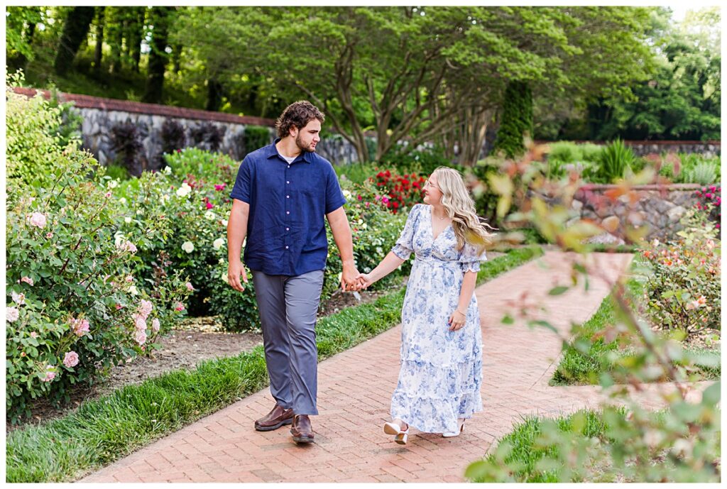 couple walking in the gardens at biltmore estate